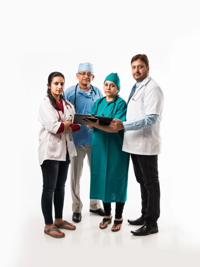 group-indian-medical-doctors-male-female-standing-isolated-white-background-selective-focus